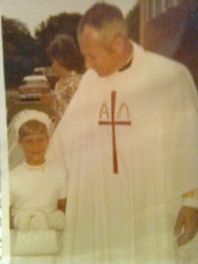 MARIANNE RECEIVED HER FIRST HOLY COMMUNION